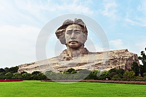 Young Mao Tse Tung statue